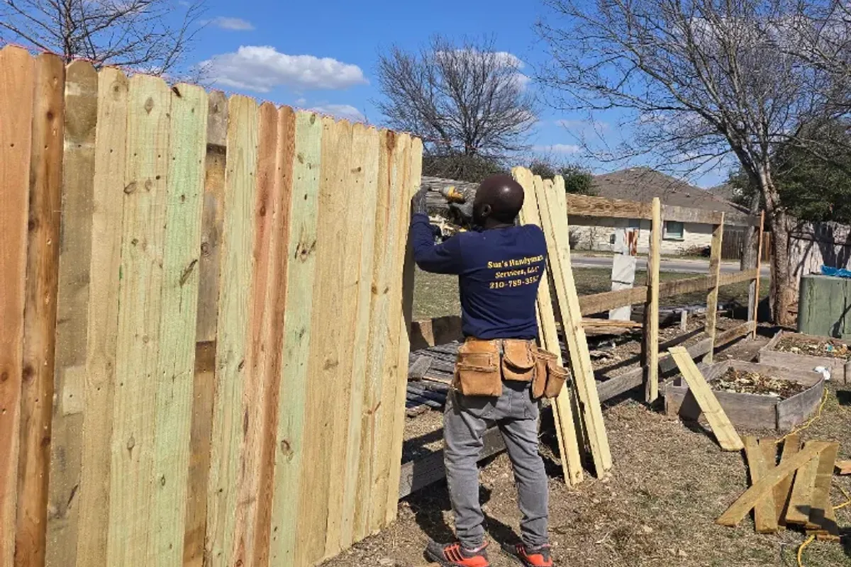 Handyman completing home maintenance and repairs